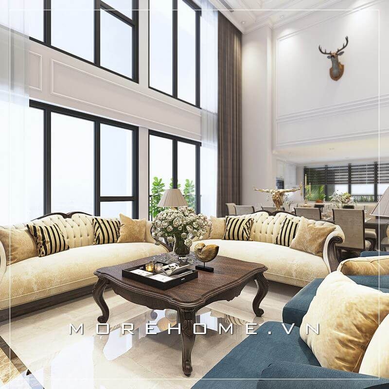 Bộ sofa khung gỗ óc chó cao cấp được thiết kế theo phong cách tân cổ điển uốn lượn đầy nghệ thuật kết hợp cùng phần vỏ bọc nhung êm ái và sắc vàng xứng đáng là tâm điểm của phòng khách chung cư thông tầng Duplex, Penthouse.